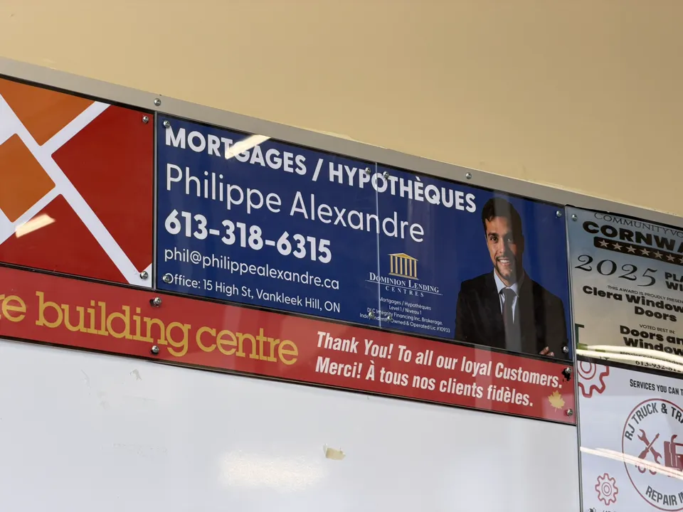 Philippe Alexandre mortgage advertisement on the community board at Home Hardware in Alexandria, Ontario